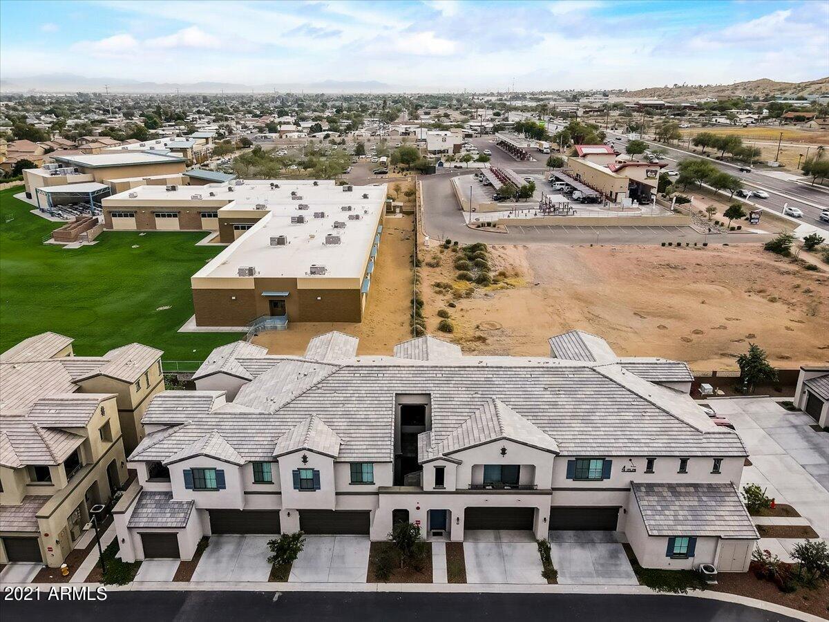 3900 East Baseline Road, Unit 127 Phoenix, AZ 85042 - Photo 58 of 60 an aerial view of residential houses with outdoor space and ocean view