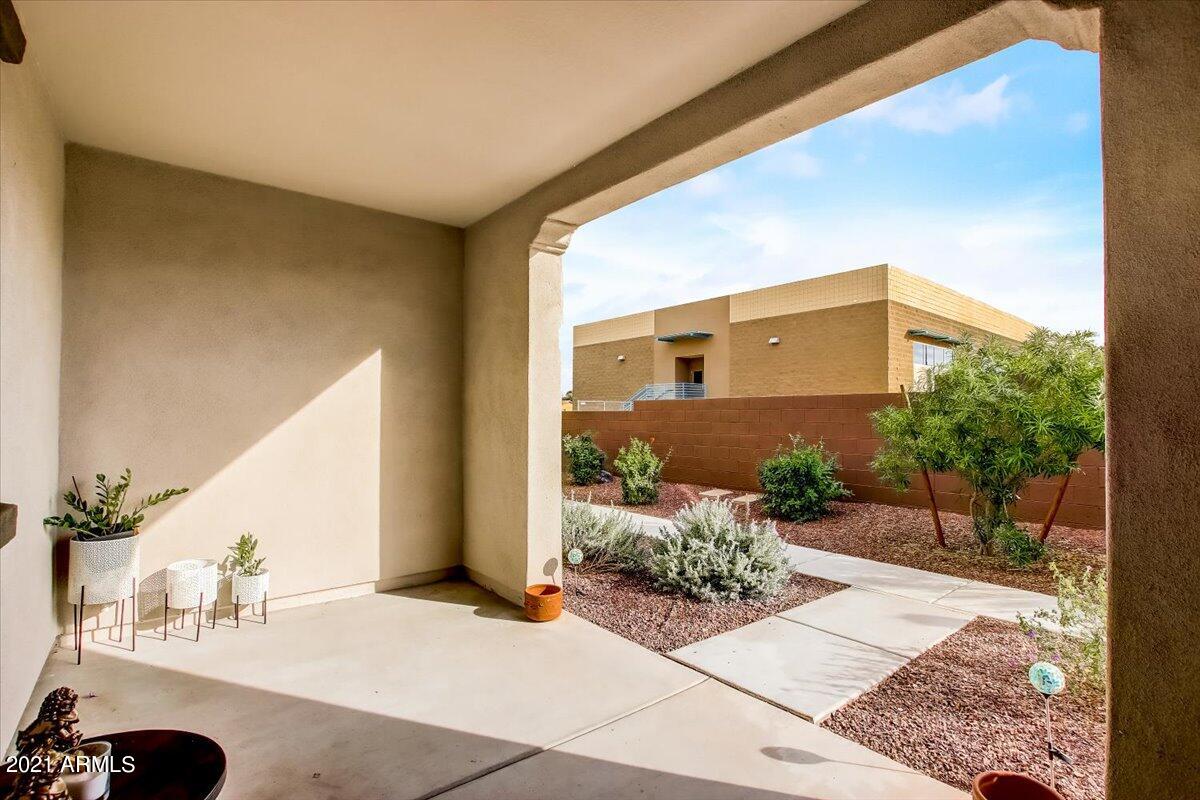 3900 East Baseline Road, Unit 127 Phoenix, AZ 85042 - Photo 6 of 60 a view of a house with a backyard