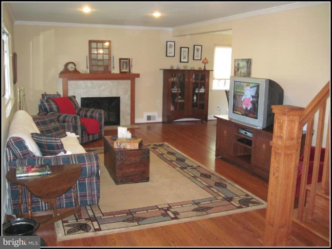6498 Little Falls Road Arlington, VA 22213 - Photo 20 of 30 Large living room with hardwood floors