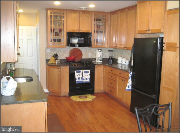 6498 Little Falls Road Arlington, VA 22213 - Photo 8 of 30 Updated kitchen with loads of cabinets