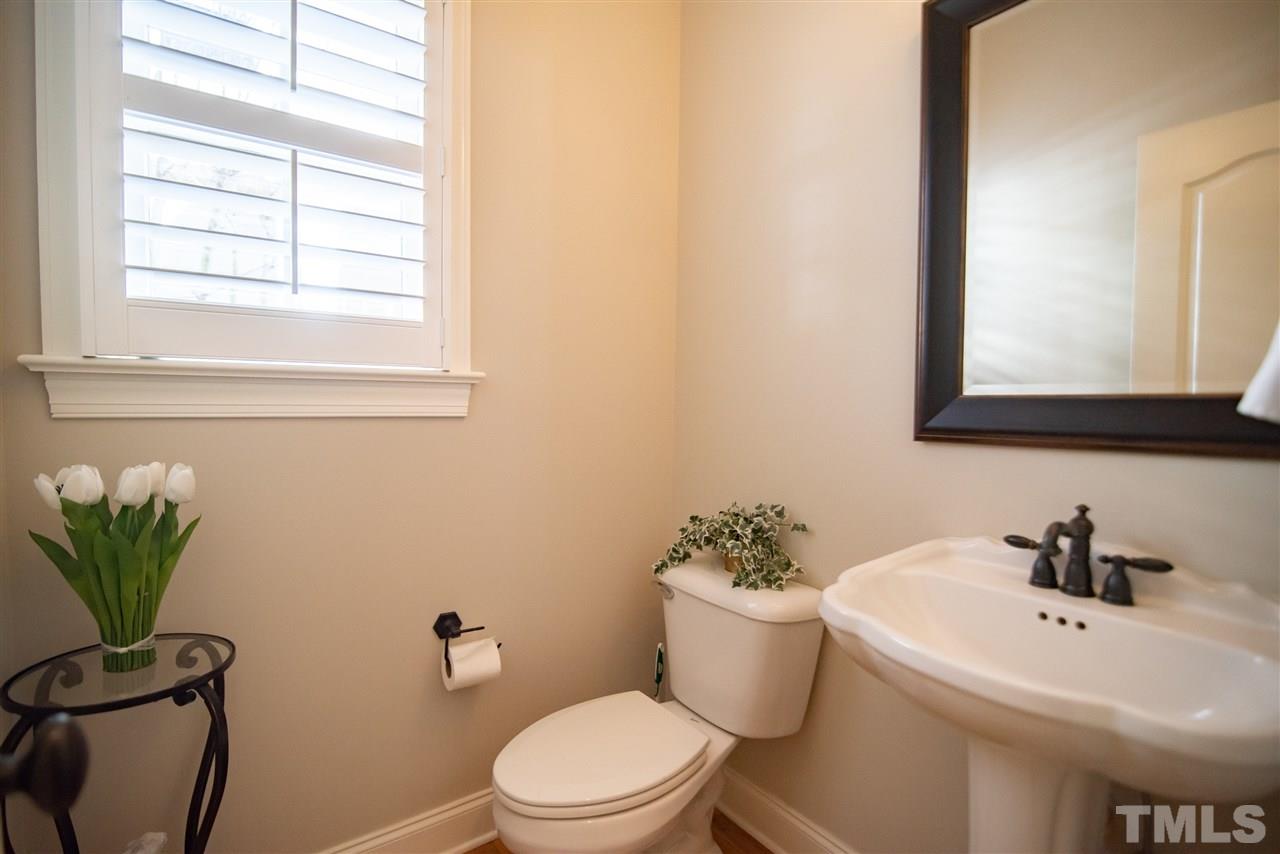 2203 Hopeton Avenue Raleigh, NC 27614 - Photo 14 of 25 This powder room is sensibly designed for guests.
