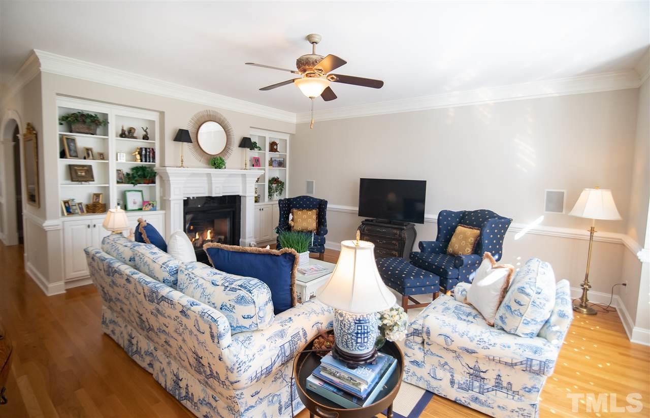 2203 Hopeton Avenue Raleigh, NC 27614 - Photo 10 of 25 This family room is a welcome dose of warmth! Built-in bookcases provide you with the perfect place to display decor and family mementos.