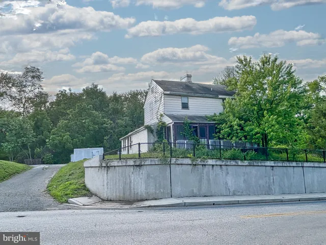 a view of house with outdoor space