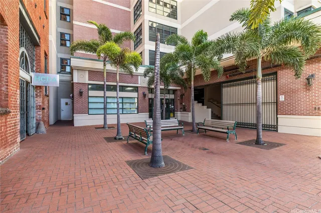 a view of a building with a patio