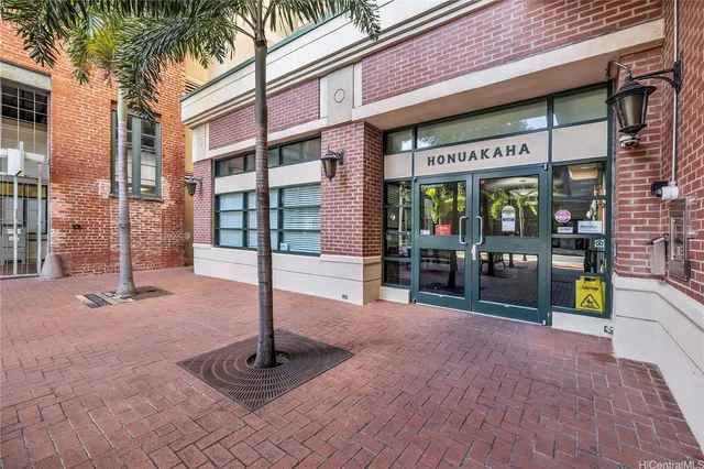 a view of a hallway with wooden shelves