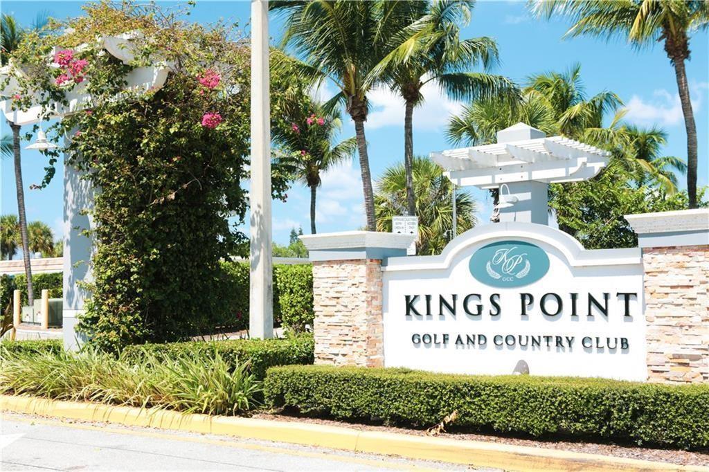 352 Saxony Trail, Unit 352 Delray Beach, FL 33446 - Photo 17 of 17 a sign on the side of a building