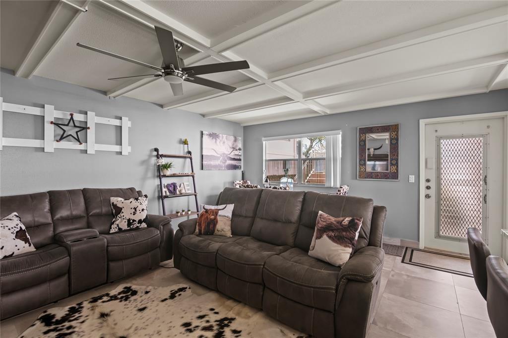 352 Saxony Trail, Unit 352 Delray Beach, FL 33446 - Photo 5 of 17 a living room with furniture and a wooden floor