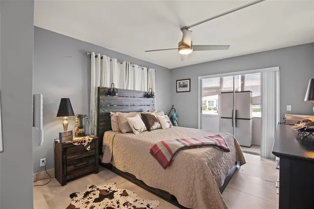 a room with a bed furniture and a window