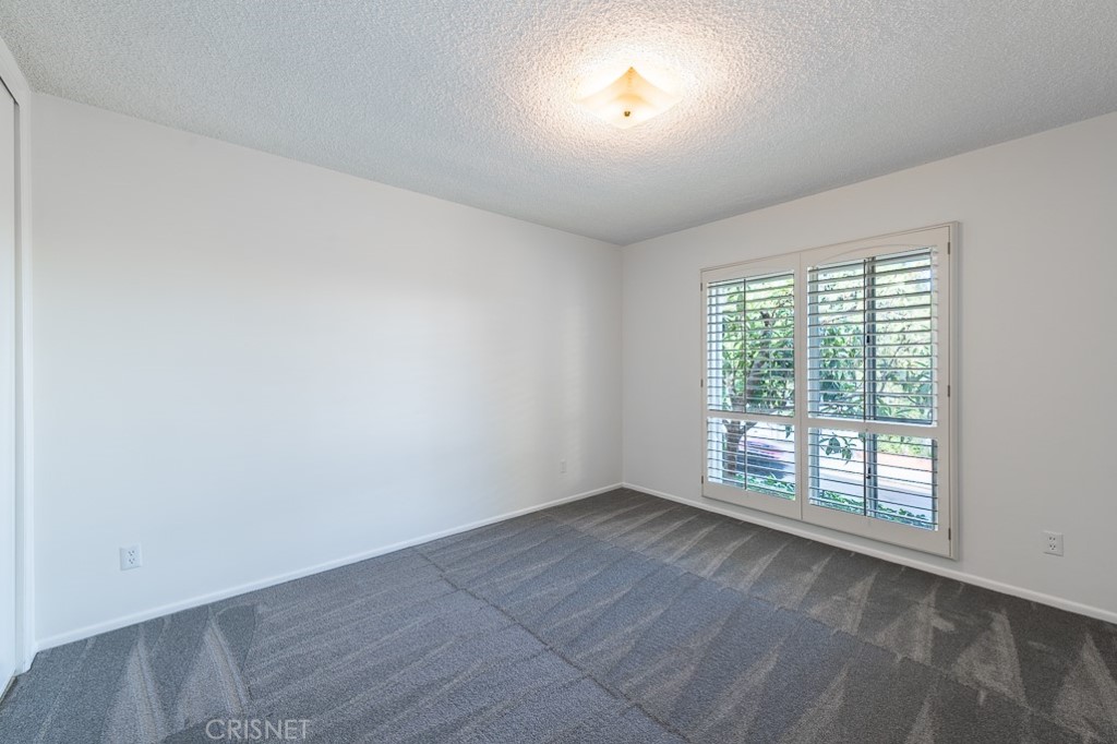 3949 Ballina Drive Encino, CA 91436 - Photo 23 of 31 an empty room with windows