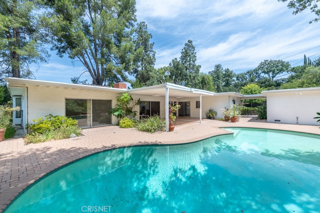 3949 Ballina Drive Encino, CA 91436 - Photo 31 of 31 front view of a house with a yard