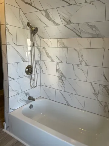 a bathroom with a bathtub