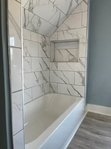 a bathroom with a bathtub