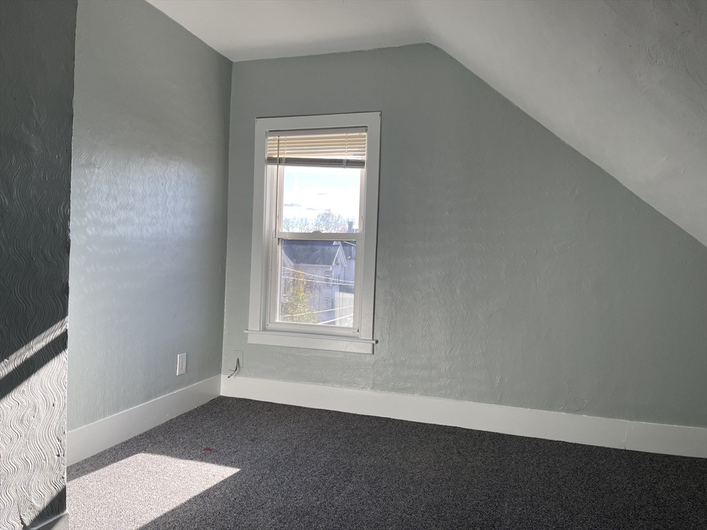 24 Union Street, Unit 3 Taunton, MA 02780 - Photo 9 of 10 an empty room with a window