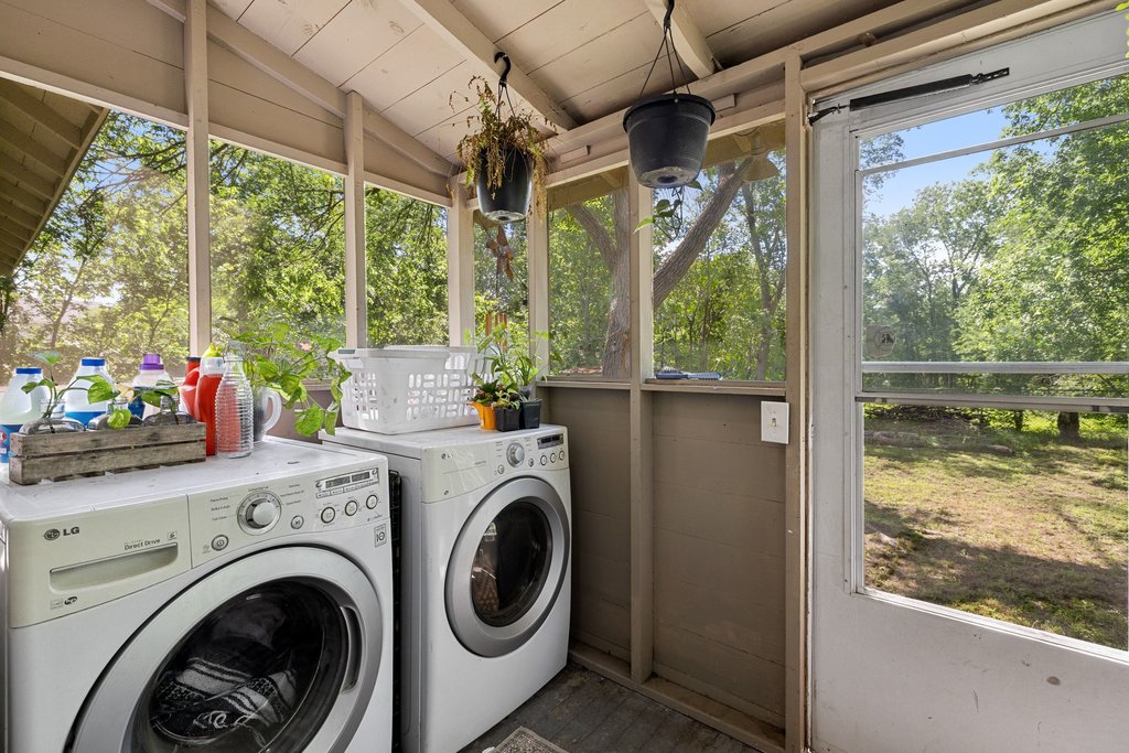 807 Cecelia Street Taylor, TX 76574 - Photo 19 of 24 a view of washer and dryer in a porch