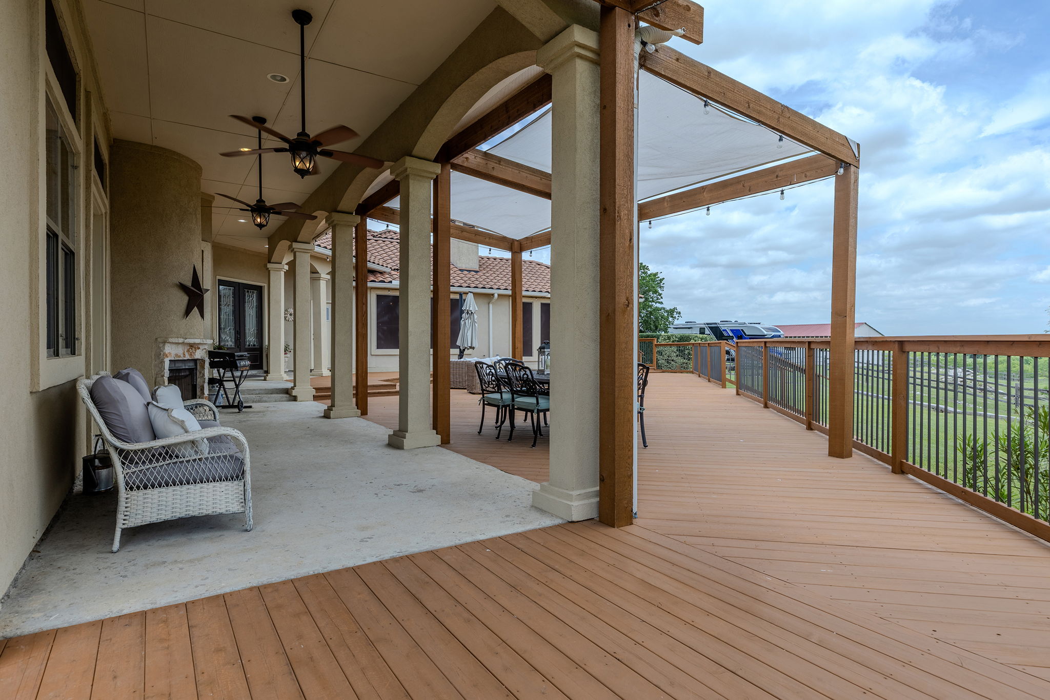 17308 St Therese Road Manor, TX 78653 - Photo 32 of 40 a view of a living room and a balcony