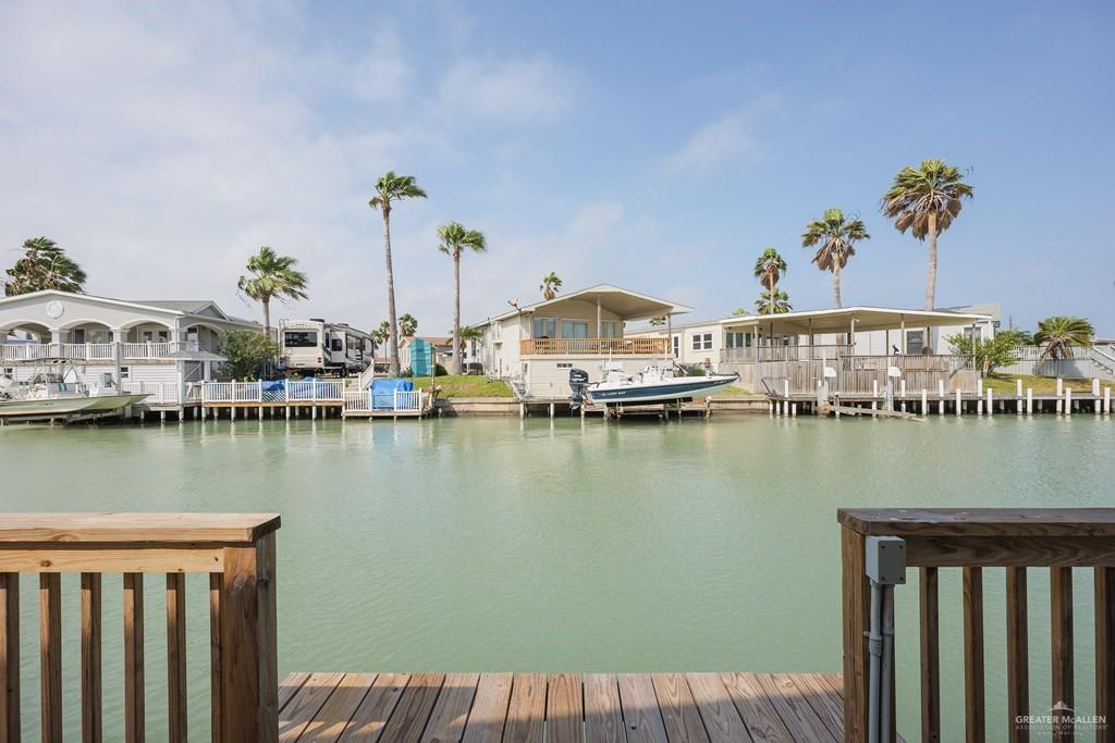 87 Abalone Circle Port Isabel, TX 78578 - Photo 21 of 40 a view of a lake from a balcony