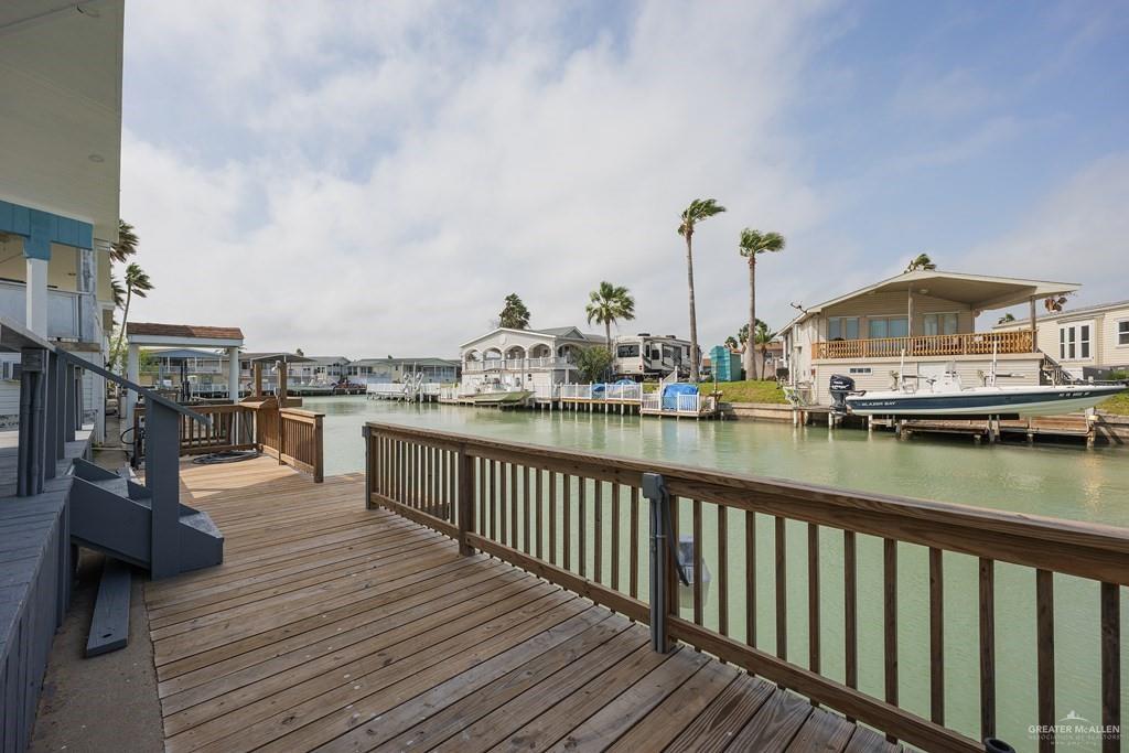 87 Abalone Circle Port Isabel, TX 78578 - Photo 22 of 40 a view of a lake from a balcony