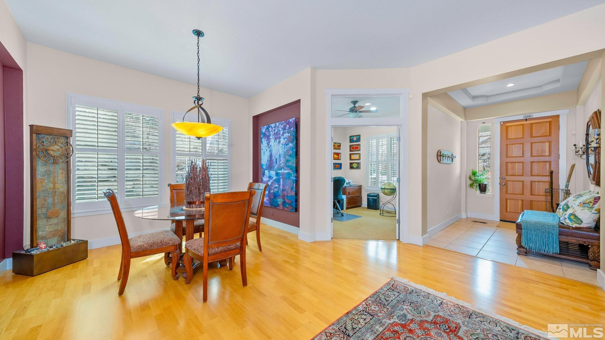 4940 Turning Leaf Way Reno, NV 89519 - Photo 13 of 34 a view of a dining room with furniture