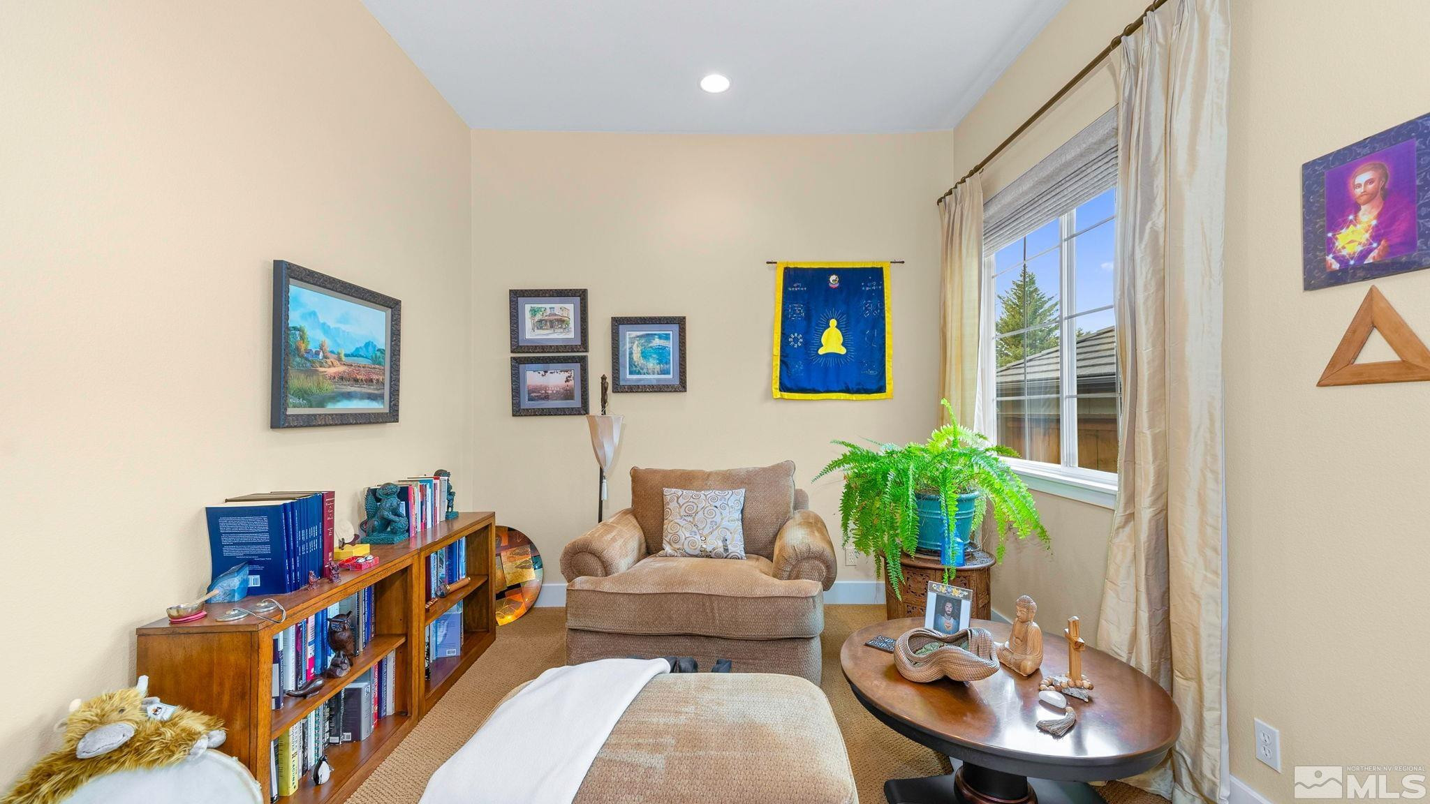 4940 Turning Leaf Way Reno, NV 89519 - Photo 21 of 34 a living room with furniture and a potted plant