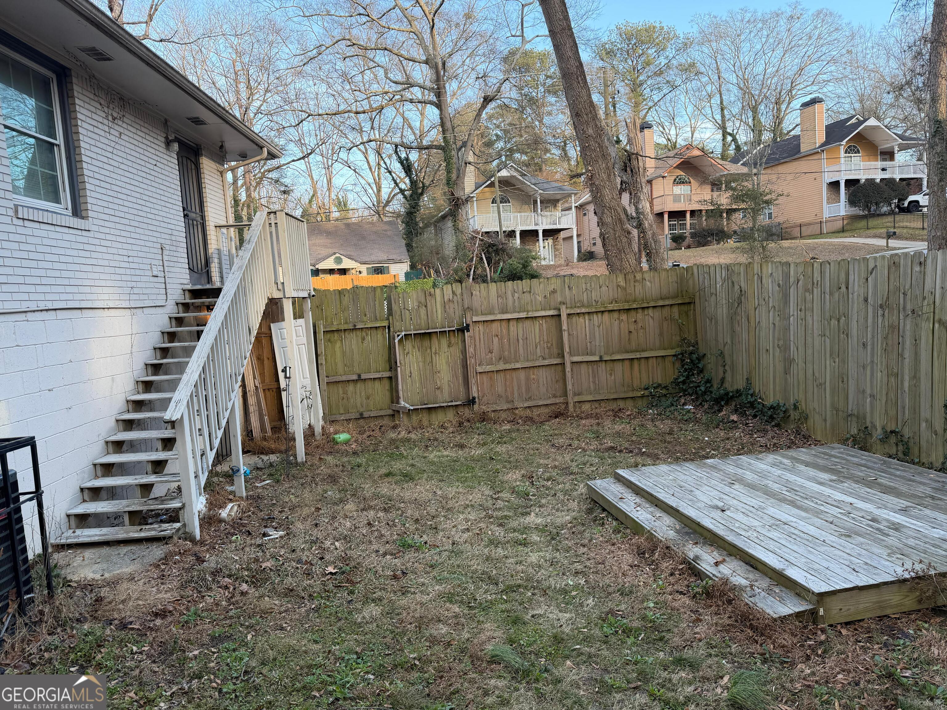 3456 Thompson Drive Northwest Atlanta, GA 30331 - Photo 18 of 18 a view of a yard with a house