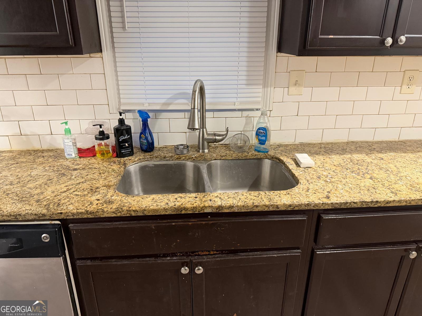 3456 Thompson Drive Northwest Atlanta, GA 30331 - Photo 3 of 18 a close view of sink and tap