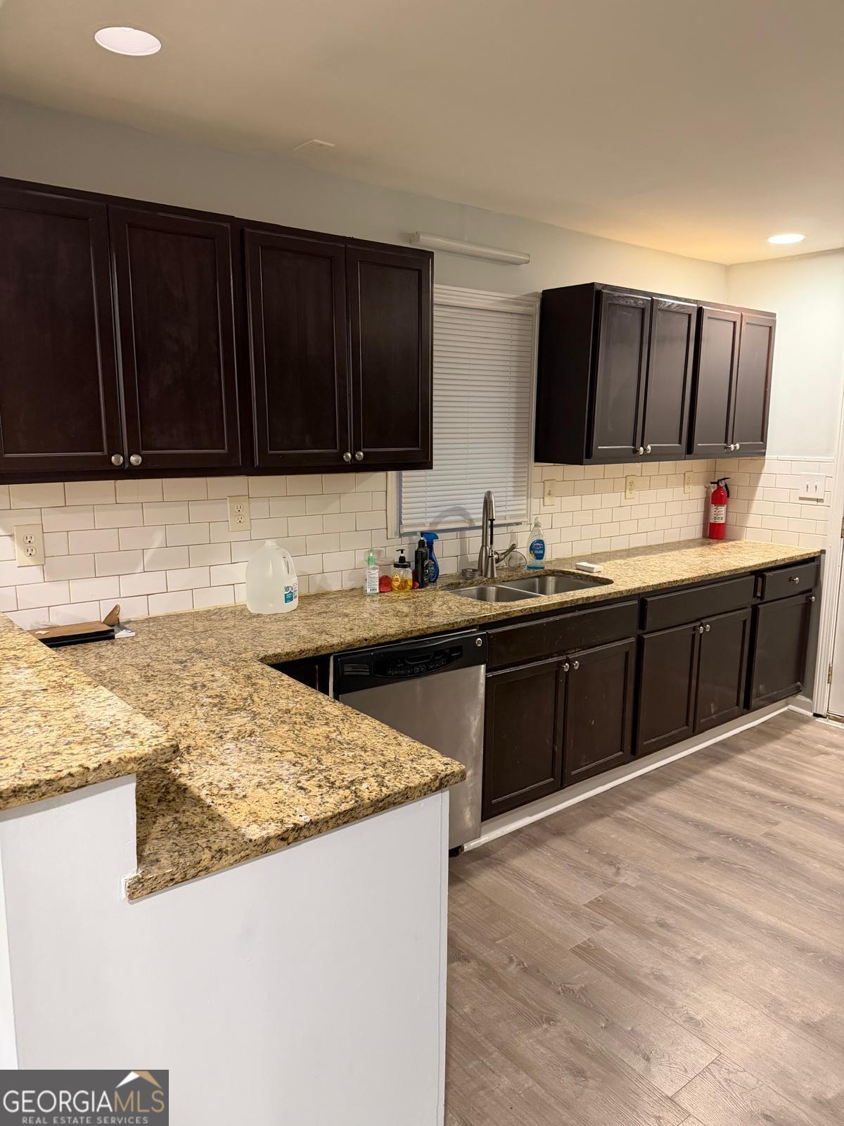 3456 Thompson Drive Northwest Atlanta, GA 30331 - Photo 5 of 18 a kitchen with a sink and a cabinets