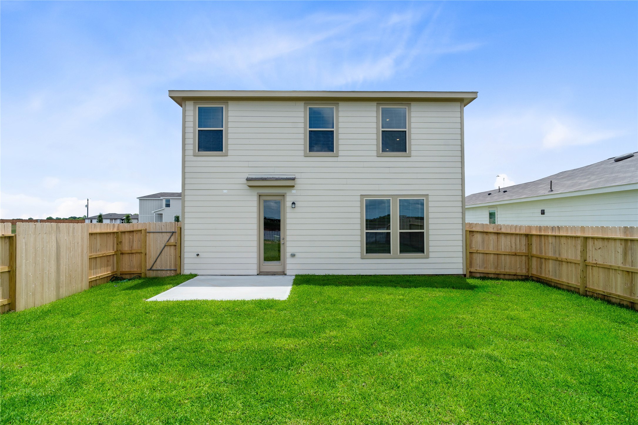 7210 Brooklea Road Beasley, TX 77417 - Photo 25 of 32 Expansive lot that backs up to the community lake and path. It features plenty of backyard green space—a true blank slate ready for your dream pool, outdoor kitchen, or personal garden oasis.