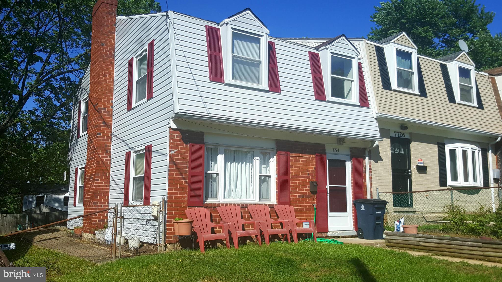 7724 Greymont Street Landover, MD 20785 - Photo 1 of 1 front view of a house with a yard