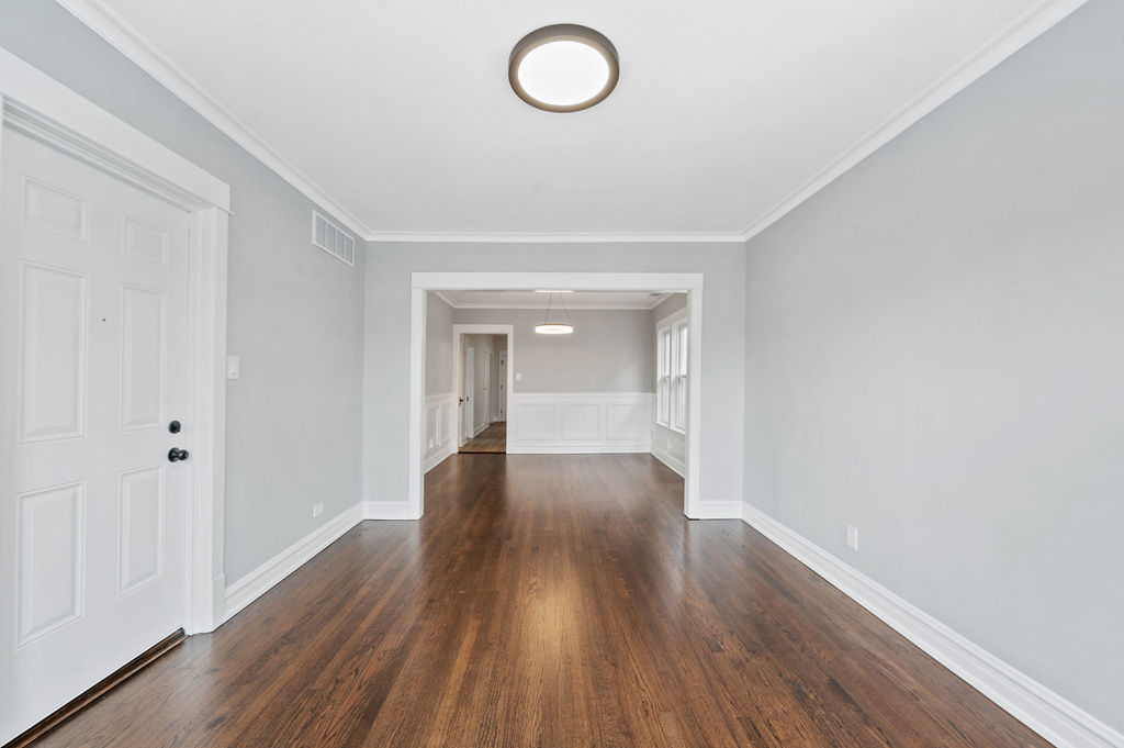 5230 West Deming Place Chicago, IL 60639 - Photo 23 of 45 a view of empty room with wooden floor