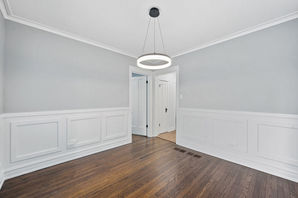 5230 West Deming Place Chicago, IL 60639 - Photo 28 of 45 a view of a room with wooden floor and white walls