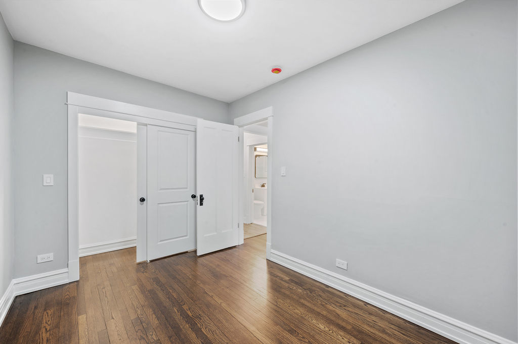 5230 West Deming Place Chicago, IL 60639 - Photo 32 of 45 a view of an empty room and wooden floor