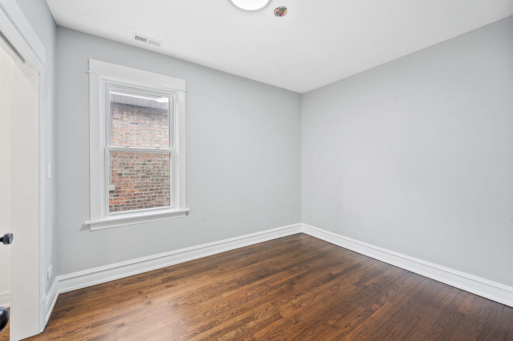 5230 West Deming Place Chicago, IL 60639 - Photo 44 of 45 wooden floor in an empty room