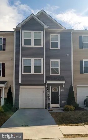 a front view of a house with yard
