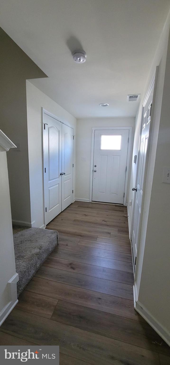 76 Capshaw Road Martinsburg, WV 25403 - Photo 2 of 12 a view of empty room with wooden floor