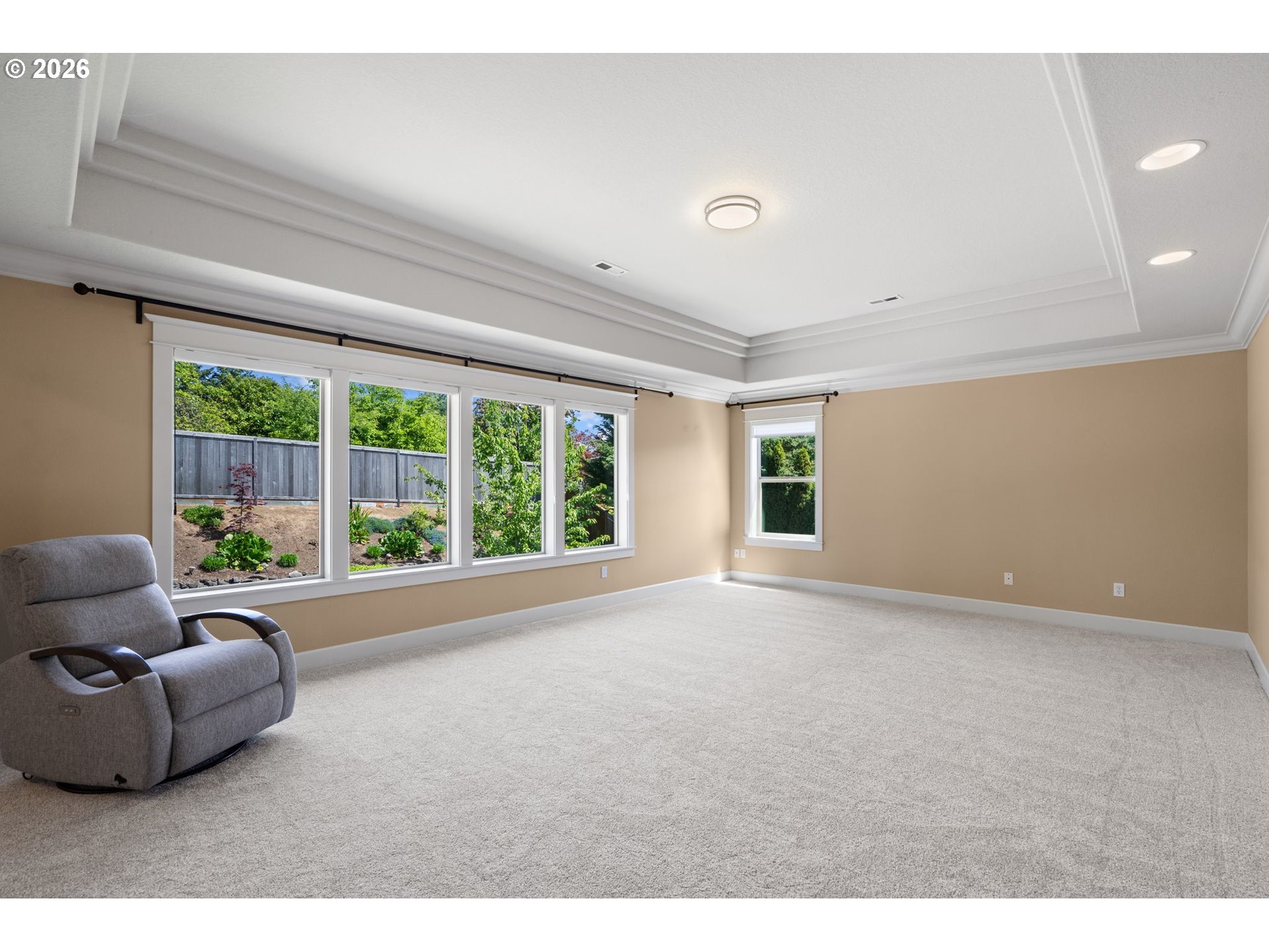 14342 Southeast Donatello Loop Happy Valley, OR 97086 - Photo 24 of 46 a living room with furniture and a large window