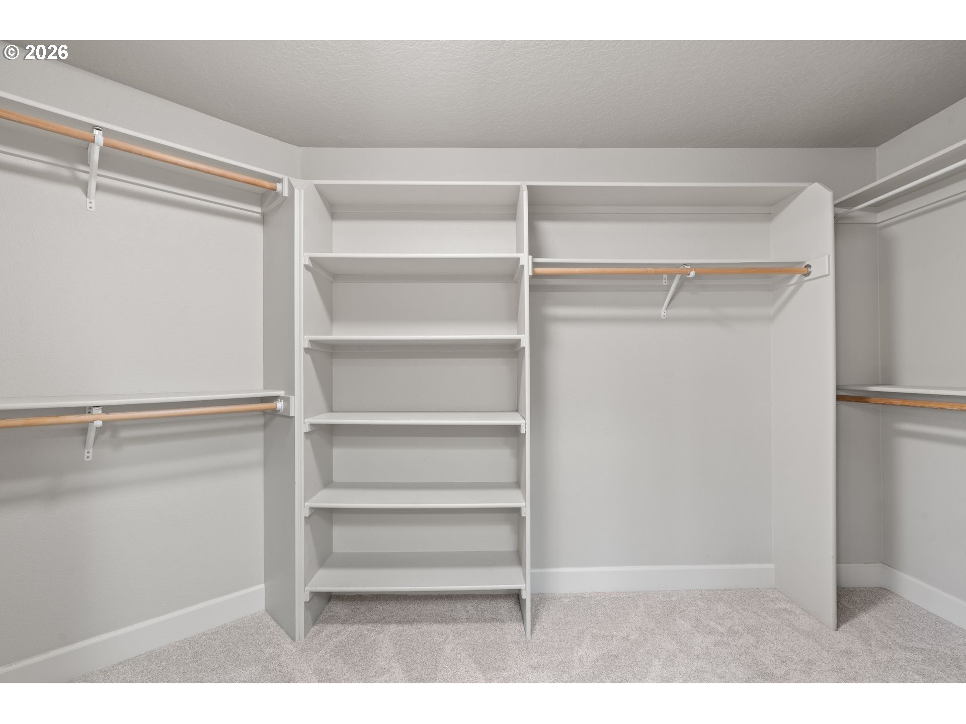 14342 Southeast Donatello Loop Happy Valley, OR 97086 - Photo 29 of 46 a view of walk in closet with empty racks