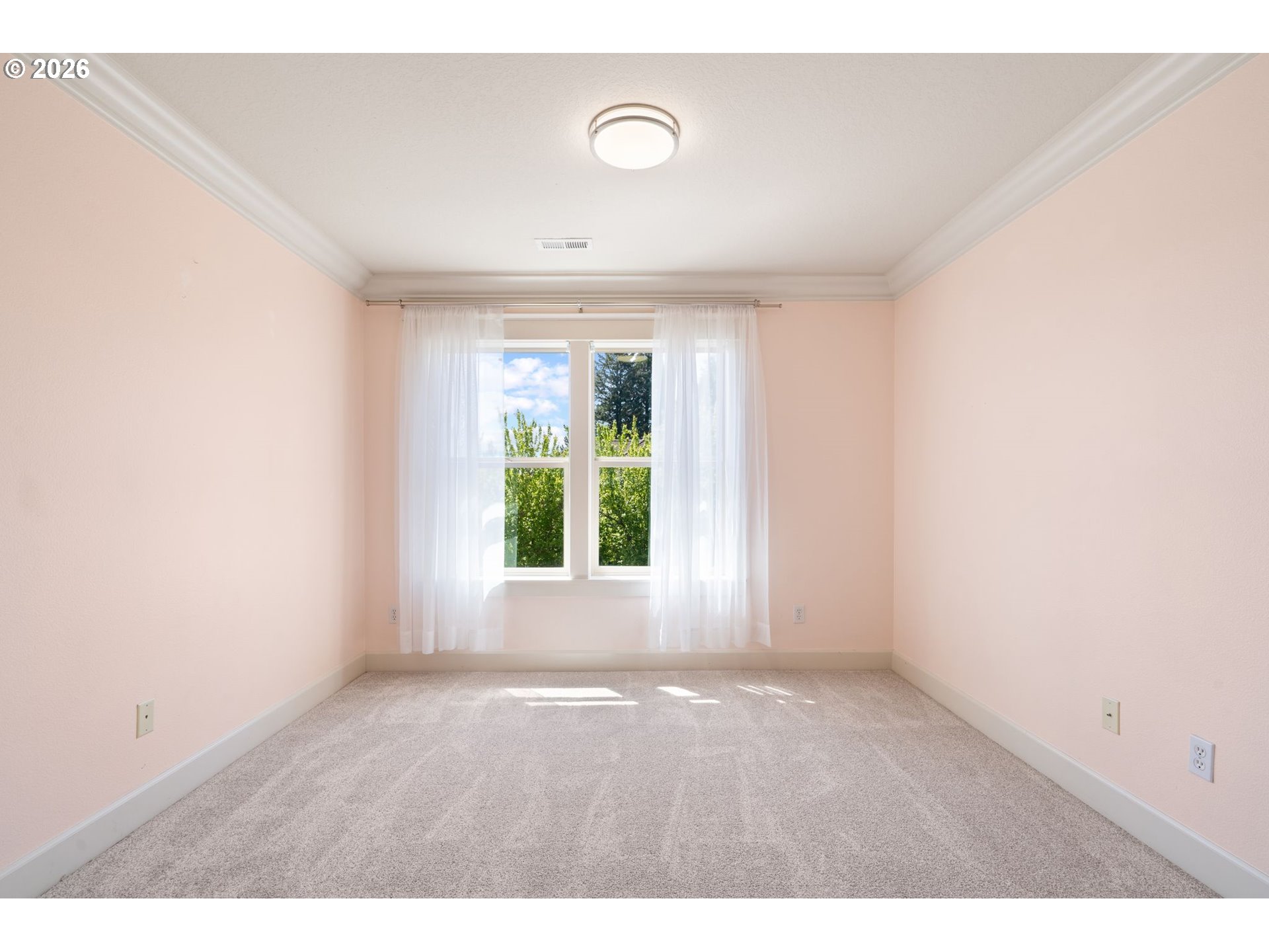14342 Southeast Donatello Loop Happy Valley, OR 97086 - Photo 31 of 46 a view of empty room with wooden floor