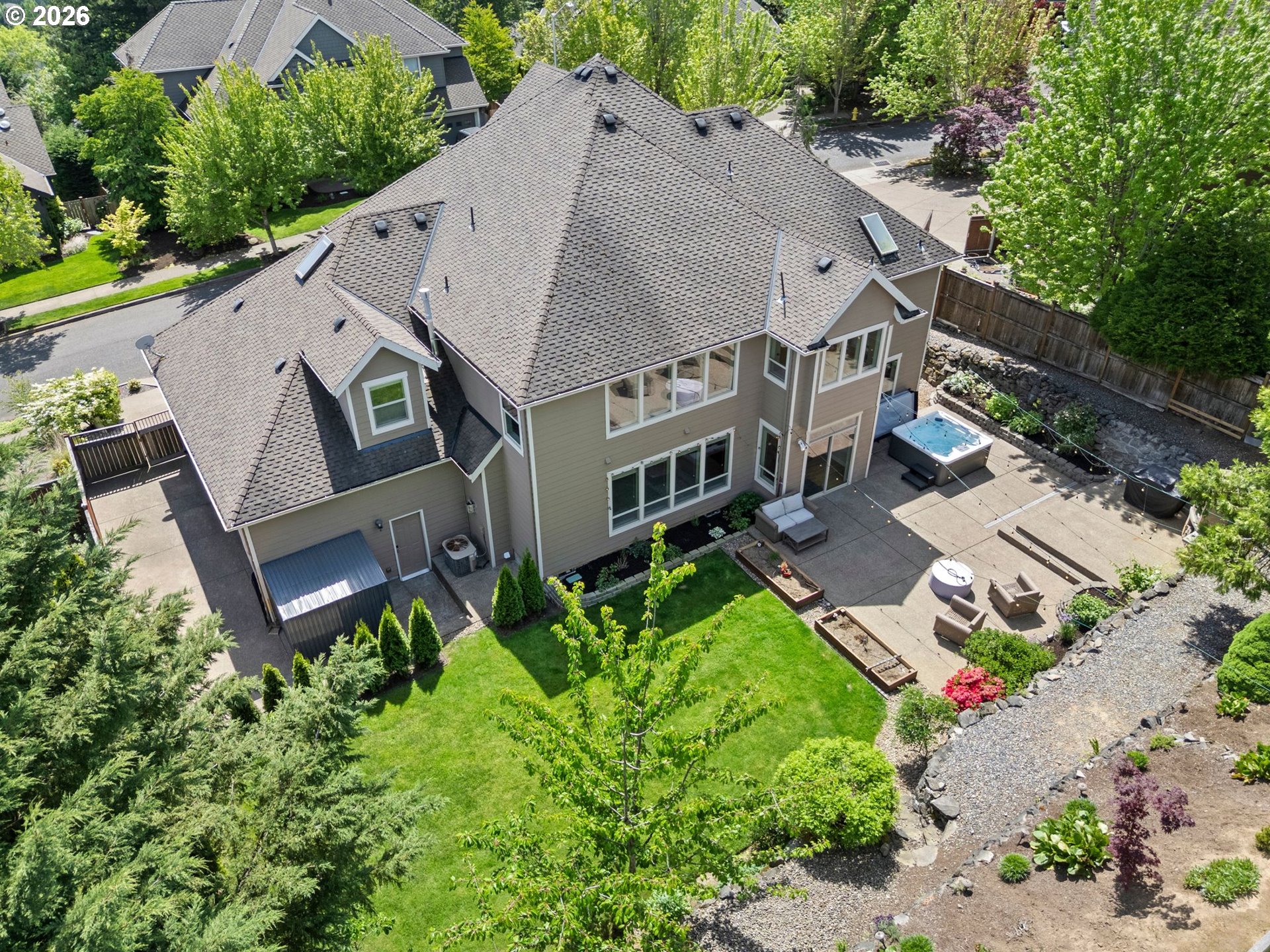 14342 Southeast Donatello Loop Happy Valley, OR 97086 - Photo 35 of 46 an aerial view of a house with a yard