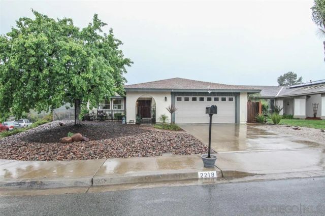 a front view of a house with a porch