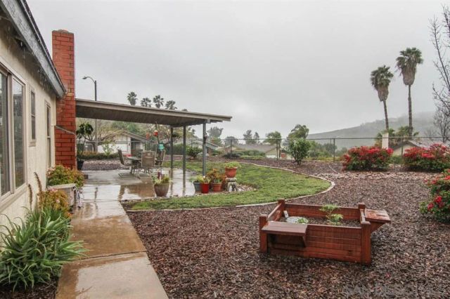 a garden view with a seating space