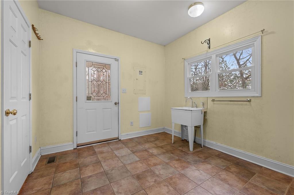 4794 Troy Smith Road Liberty, NC 27298 - Photo 20 of 50 large laundry/mudroom
