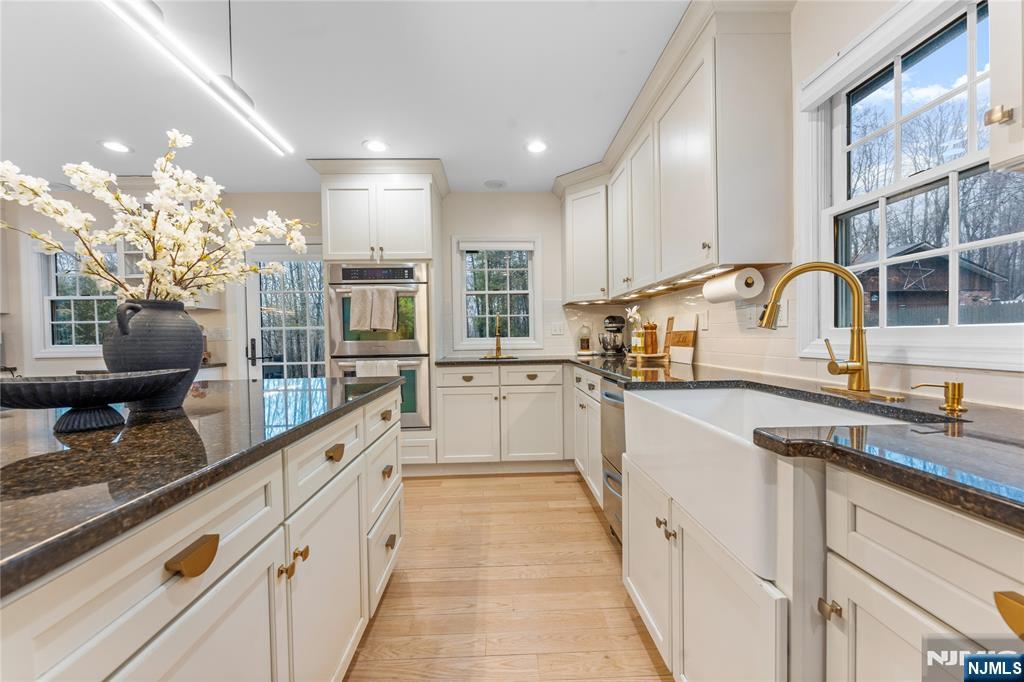 163 La Rue Road West Milford, NJ 07435 - Photo 14 of 28 a large white kitchen with stainless steel appliances granite countertop lots of counter top space