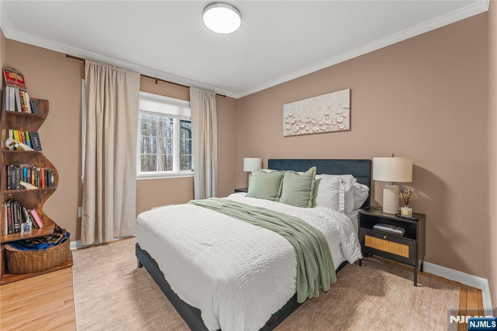 163 La Rue Road West Milford, NJ 07435 - Photo 17 of 28 a bedroom with a bed and a window
