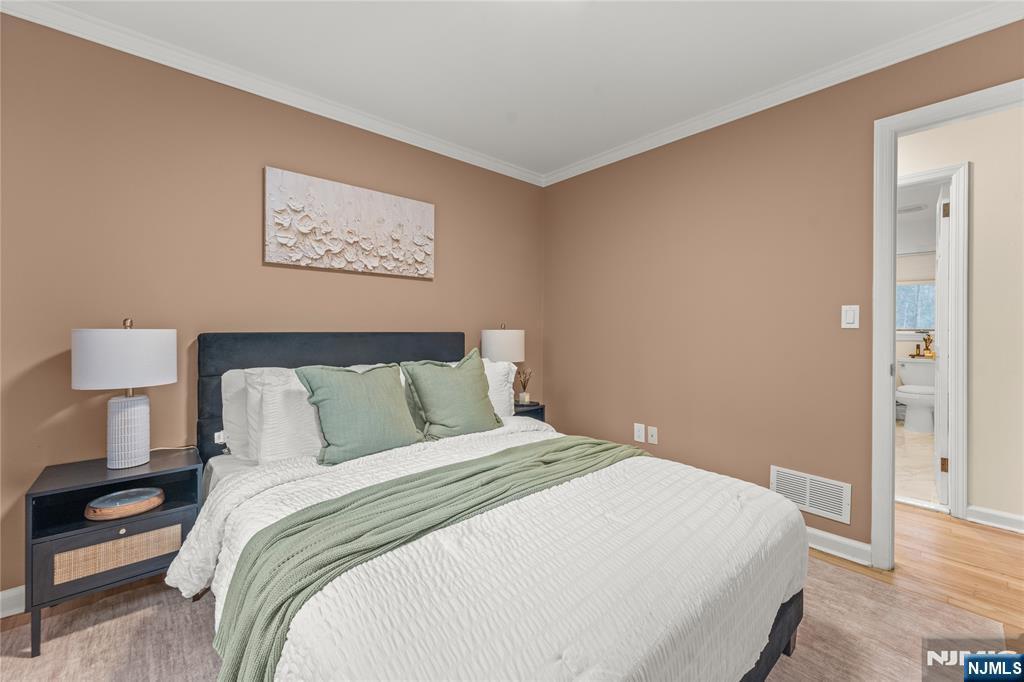 163 La Rue Road West Milford, NJ 07435 - Photo 18 of 28 a bedroom with a bed and a night stand