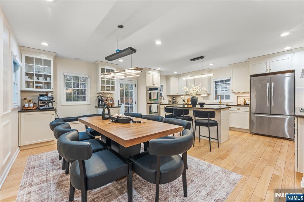 163 La Rue Road West Milford, NJ 07435 - Photo 8 of 28 a large kitchen with a table and chairs