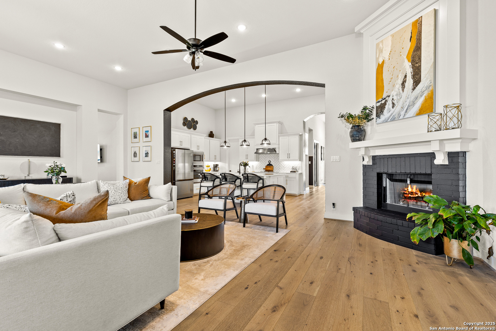 507 Caliban Cibolo, TX 78108 - Photo 18 of 63 a living room with furniture wooden floor and a fireplace