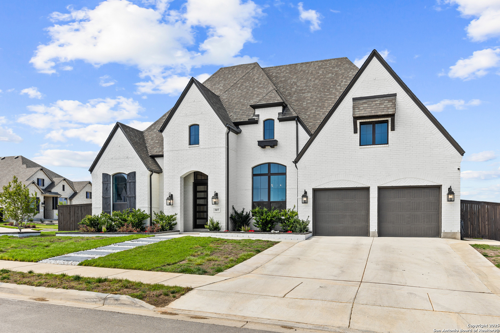 507 Caliban Cibolo, TX 78108 - Photo 2 of 63 a front view of a house with a yard and garage