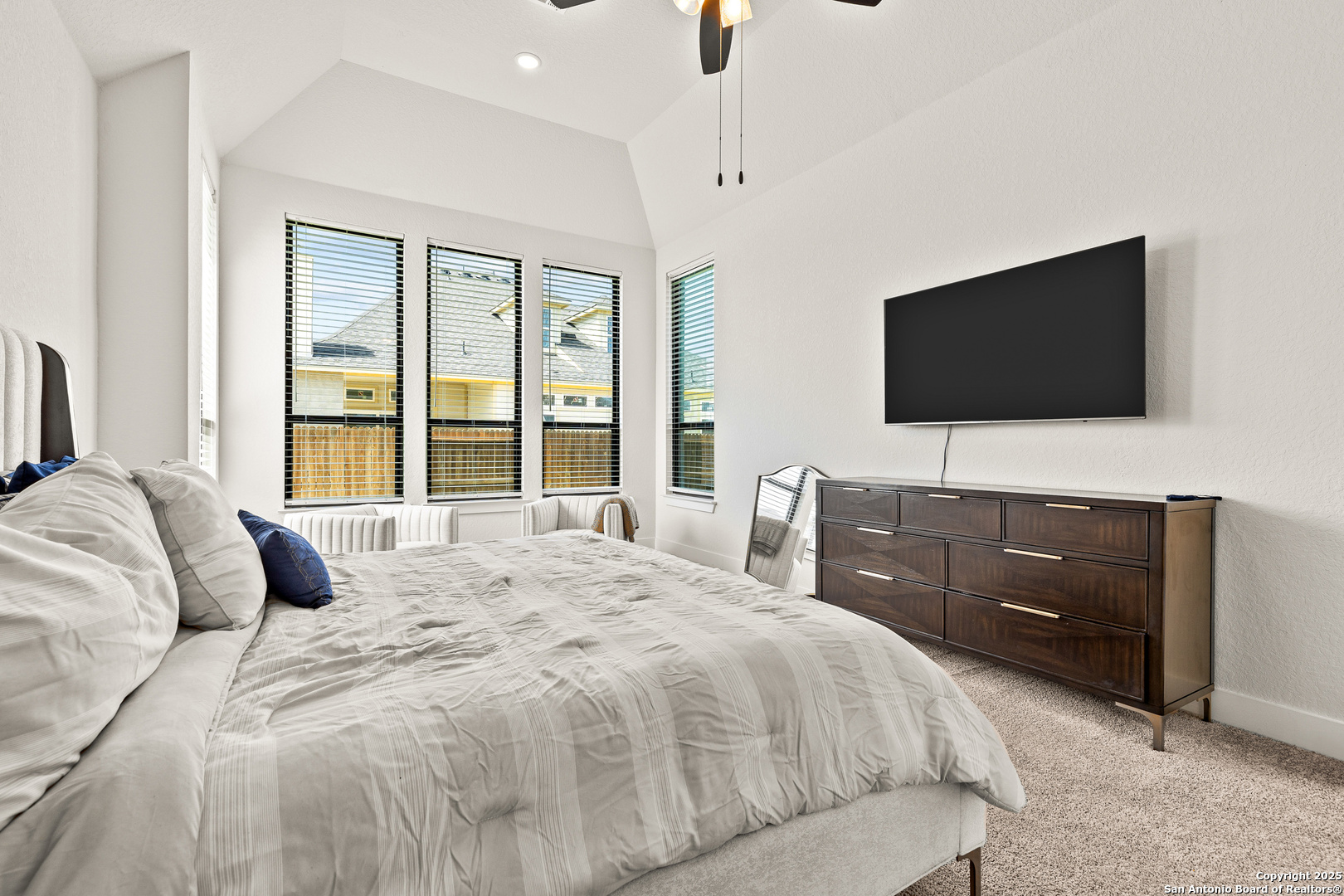 507 Caliban Cibolo, TX 78108 - Photo 25 of 63 a bedroom with a bed and a flat screen tv