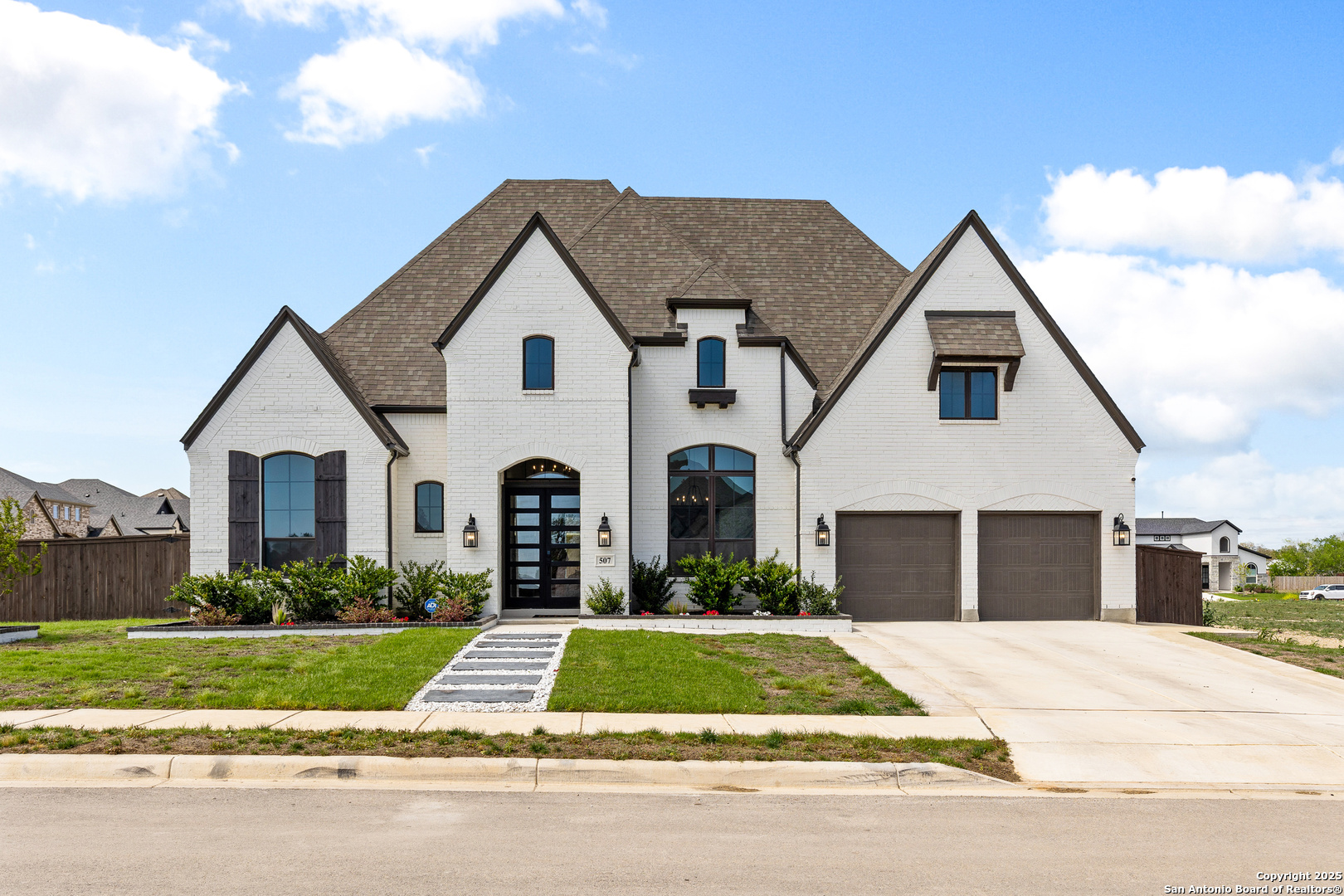 507 Caliban Cibolo, TX 78108 - Photo 3 of 63 a front view of a house with a yard