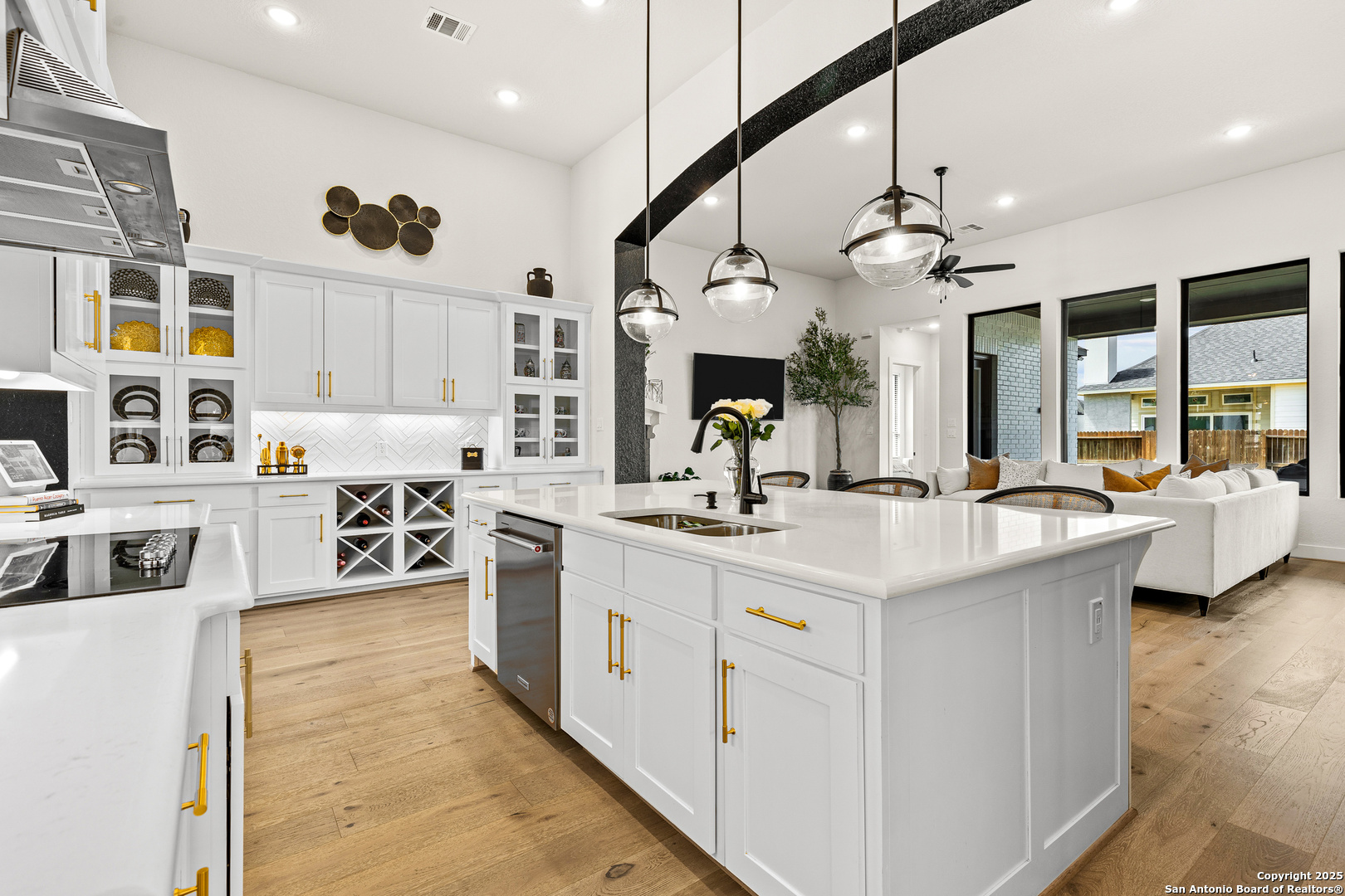 507 Caliban Cibolo, TX 78108 - Photo 7 of 63 a kitchen with stainless steel appliances granite countertop a sink a stove and a refrigerator